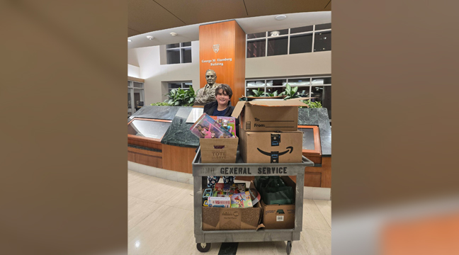 Ezekiel with care packages. (Submitted Photo).