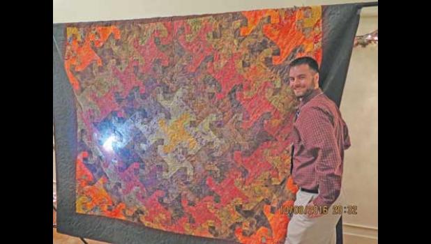 BILL TRETHAWAY of Bloomington was the winner of a wall-scale hand-crafted quilt donated to the Historical Society by Marilyn Bujalski of Clear Lake.