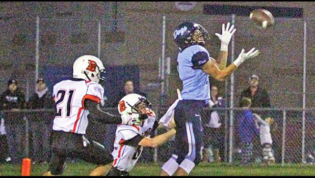 BECKER’S LUKE EIGEN split the Delano defenders on this 50-yard pass from Josh Fobbe, turned and carried the ball the rest of the way into the end zone for Becker’s second TD of the game. Eigen finished with two catches for 58 yards and the one score. (Photo by Bill Morgan).