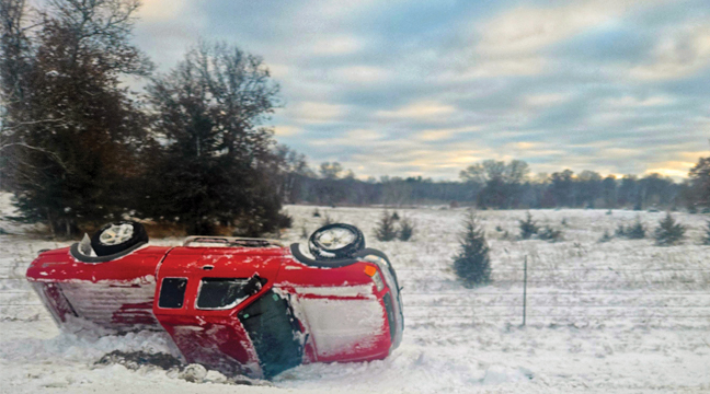 WINTER WEATHER MISHAPS.  A pick up truck rolled over close to the intersection of County Road 16 and Hwy 23 north of Becker last Thursday afternoon. A MN State Trooper was on the scene. Several recent snowfalls have caused icy patches on local roads and led to a number of accidents. ( Patriot Photo by Mary Nehring).