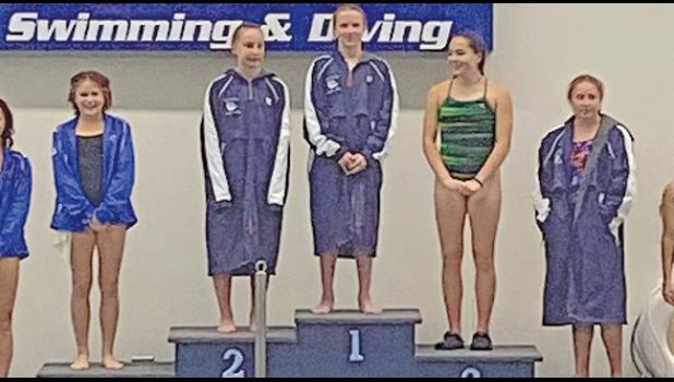 BELLA BUSCHEL AND EMMA HENNESSEY led the diving competition, taking home 1st and 2nd, respectively. (Submitted Photo)