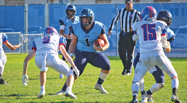 BECKER FULLBACK CARTER CALLAHAN (MIDDLE) scored three times and rambled for 113 yards on 18 carries in Becker’s road win over St. Cloud Apollo last Friday night, 23-18. (Photo by Sara Waytashek)