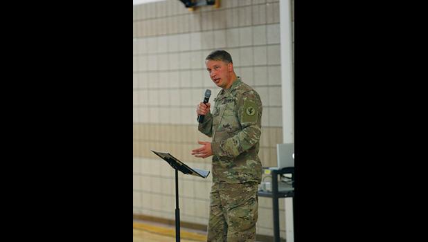 BECKER 2006 GRADUATE JAKE HOVDE (right) was the featured speaker at Monday’s Veteran’s Day program at the Primary School. Hovde is a Captain in the U.S. Army and has been deployed three times. 