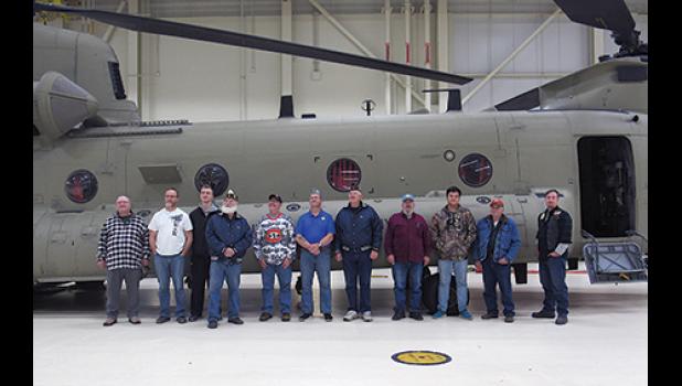 MEMBERS OF THE BECKER AMERICAN LEGION and guests on tour at the Minnesota Army National Guard Aviation facility. (Photo by Penny Leuthard)