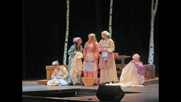 TEVYE’S DAUGHTERS, played by Amber Vogel, Emma Tweten, Larissa Tollefson, Michelle Johnson and Karly Kowalsky discuss who the matchmaker may find for them during Fiddler on the Roof Friday night. (Photo by Penny Leuthard)
