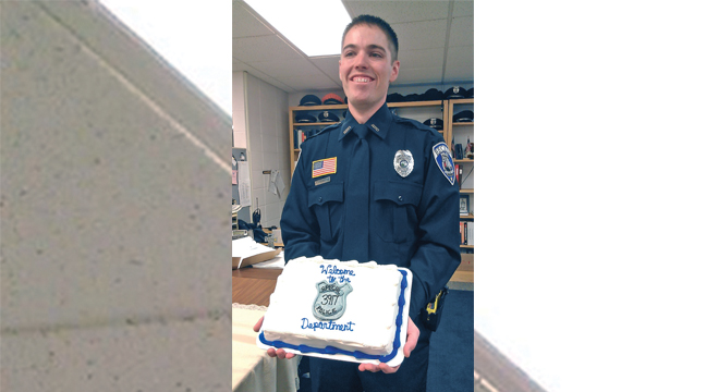 CHRIS LINDBLOOM (above) on his first day at Becker PD where he received a cake from the department. (Submitted Photo).