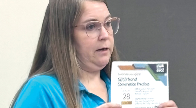 MIRANDA WAGNER from Sherburne Co. Soil and Water provided an update on recent activities the department has been involved in. (Photo by Penny Leuthard)