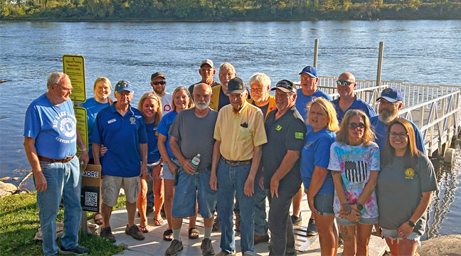 BECKER LIONS MEMBERS stood on the pier at the re-branded Lions Park at Snuffy’s Landing. Sept. 25 marked the 50th Anniversary of the Becker Lions Club and the public was invited to the park for festivities and remembrance. (Patriot Photo by Mark Kolbinger.)
