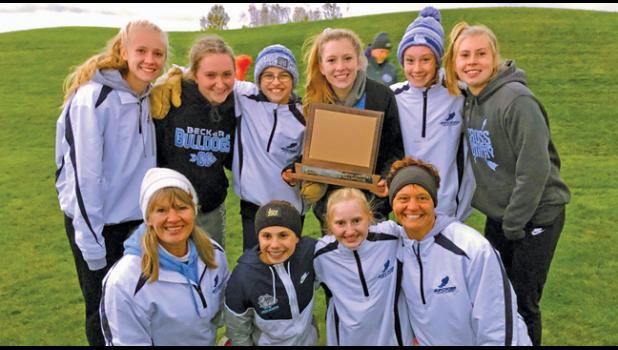THE BULLDOGS GIRLS CROSS COUNTRY TOP 8 RUNNERS proudly show off their conference championship trophy. (Submitted Photo)