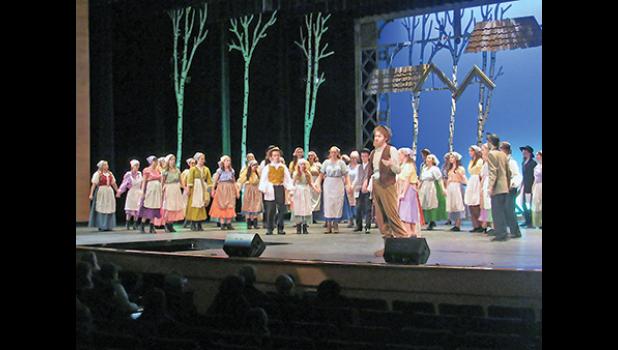 THE VILLAGERS SING ABOUT TRADITION during the prologue to the Becker High School musical, Fiddler on the Roof. (Photo by Penny Leuthard)