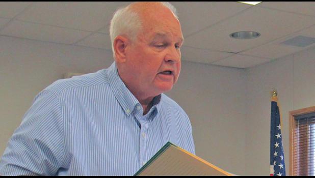 VERIZON REPRESENTATIVE RICK ADAMS explains why the company needs new variances for their proposed communications tower during the Santiago Twp. meeting Wednesday night. (Photo by Penny Leuthard)