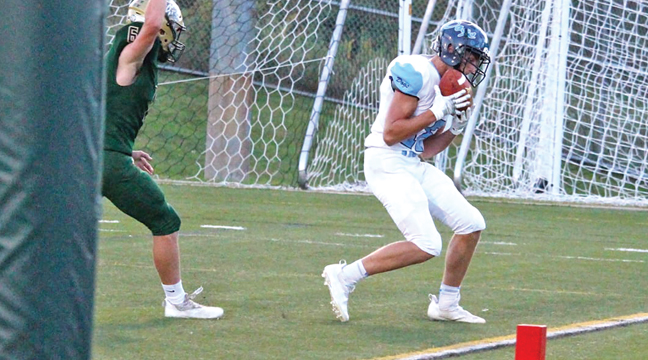 WR ALEX WEISS pulled in this pass from Ryan Bengtson to kick off the scoring in last Friday’s game against Chisago Lakes. (Photo by Sara Waytashek)