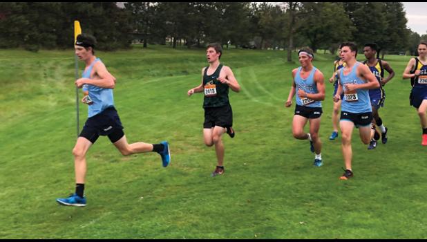 WYATT HILTNER, Jake Nelson and Ethan Tobako push themselves hard during the Bulldogs’ home meet on Tuesday. (Submitted Photo)