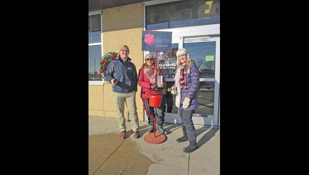 CVBC MEMBERS Garrett Urhammer (Franklin Outdoor), Lori Johnson (Johnson Materials, Inc.) and Jenny Massmann (American Heritage National Bank) brave the cold Thursday to ring the bell for the Salvation Army in front of Coborn’s in Clearwater. See story on page 5. (Photo by Penny Leuthard)