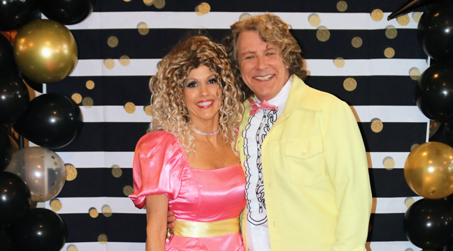 Travis and Brooke Williams pose for photos in their eye-popping outfits. (Submitted Photo).