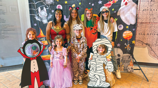 Allyssa Driscoll brought her family and their friends dressed for the event.  Back row – Allyssa, Bella, Myla, and Aubrey.  Front row – Kalani, EverLee, Kane, and Kendalynn.  (Patriot Photo by Don Bellach)