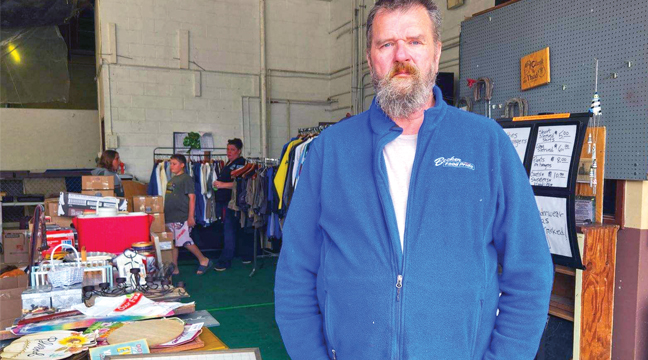 Kevin Philipczyk of the Becker American Legion was working the garage sale, which will be open Friday through Sunday through the month of July.  (Patriot Photo by Mary Nehring).