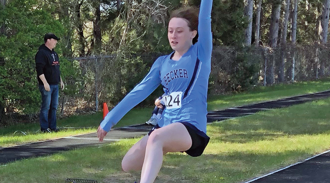 KYLEE MORTON flies through the air during her long jump at Princeton last Tuesday.  (Photos captured from video.)