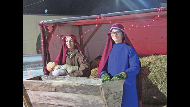 BRINGING THE REASON FOR THE SEASON TO LIFE, Oakwood Community Church held their annual drive-through nativity story last weekend. (Photo by Penny Leuthard)