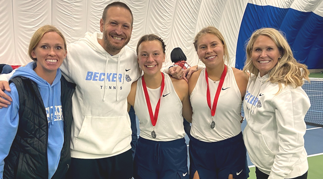 Ayla Brown and Dani Nuest celebrated with their coaches, Alyssa Stevens, Nate Bucher and Jen Anderson, after securing a spot in the State Class AA Individual Tennis Tournament. (Submitted photo.)
