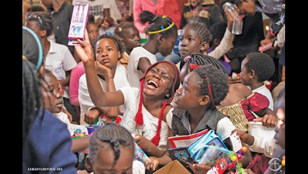 OPERATION CHRISTMAS CHILD has a lasting effect on children across the world. In the photo above, a young girl from Zambia reacts to getting toothbrushes in her shoebox. (Photo from Samaritan’s Purse).