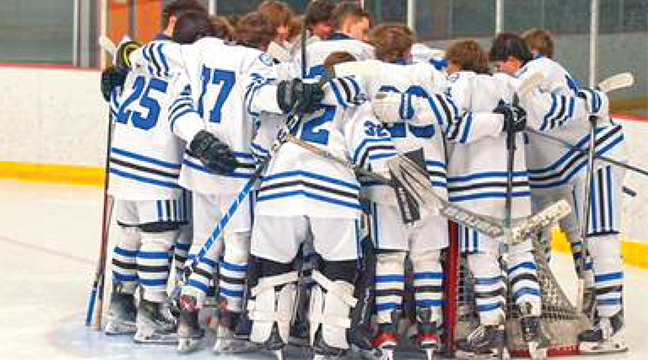THE Becker/Big Lake Eagles huddle up before the game against Cambridge-Isanti Bluejackets.. (Submitted Photo).