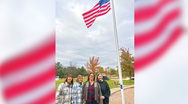 Frank Kolbinger’s four surviving daughters were on hand Saturday for the dedication ceremony at their father’s namesake park in Becker. A new flagpole was donated by the Becker Lions Club. Pictured are Judy Haus, Kay Nelson, Fran Seele and Pam Scherber. (Submitted Photo).