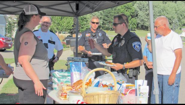 BECKER LAW ENFORCEMENT and fire department were warmly welcomed at every Night to Unite event they attended Tuesday night. 