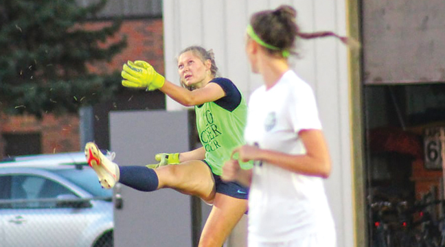 JUNIOR GOALKEEPER LIZ MACKENDANZ launches a free kick from the Becker zone during the Sept. 28 home match against Chisago Lakes. (Submitted Photo)