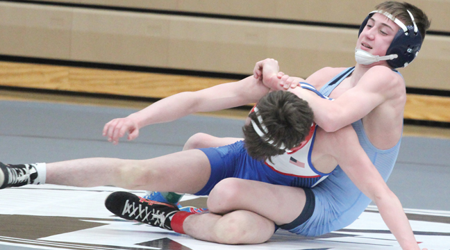 Kaden Nicolas had the upper hand early in his quarterfinal match at the State Class AA Wrestling Tournament (photo courtesy of Eric Kraushar-Chaska Herald).