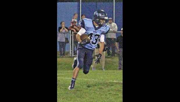 RB KEVIN ANDRES scored one TD and converted a third down and three with time running out to seal the Bulldog victory.(Photo by Bill Morgan).