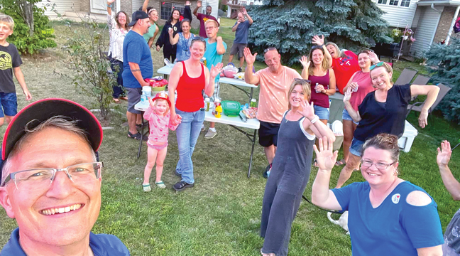 BIG LAKE MAYOR PAUL KNIER (L) met with constituents Tuesday during the annual Night to Unite event in Big Lake. (Submitted Photo)