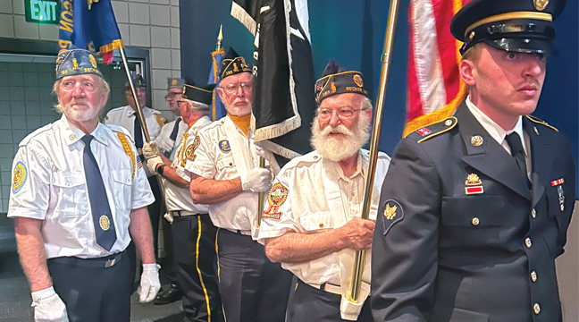 The Becker American Legion color guard prepared to post the colors before Tuesday morning’s middle school Veterans Day program. (Submitted Photo).