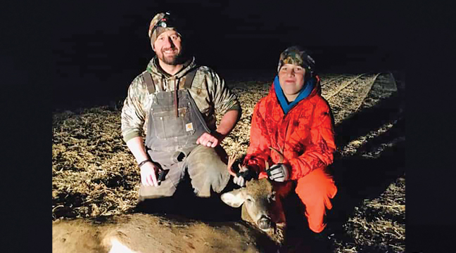 FATHER AND SON HUNT. Owen Johnson (12) harvested a 10 point buck on the last day of the youth hunt this year, accompanied by his father (Isaac Johnson). Owen hunted on his grandparents’ land (Leonard and Terry Graning) north of Becker. (Submitted Photo).