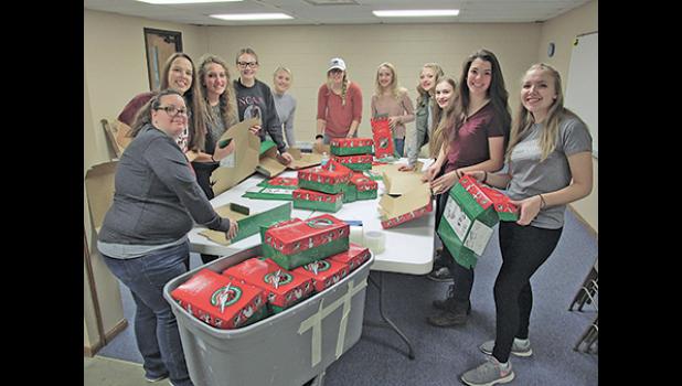BECKER BAPTIST CHURCH was the place to be last Sunday, with volunteers packing over 1,100 shoeboxes for Operation Christmas Child. (Submitted Photo)