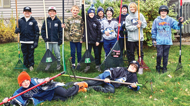 Big Lake Becker Youth Hockey Team did a great job raking the yeards they served. (Submitted Photo).