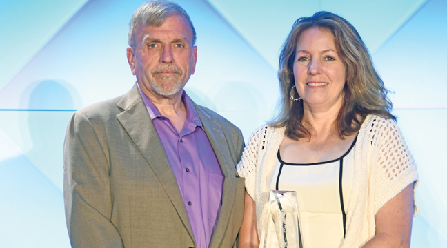 LORI AND DAVE ABLES with their award. (Submitted Photo).