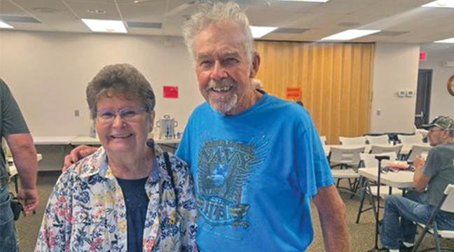 Long time Santiago residents Nancy and Richard Alickson step in line for breakfast at Santiago Town Hall. (Patriot Photo by Mary Nehring).