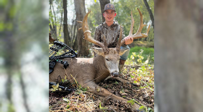 LOGAN NORTON OF CLEAR LAKE shot this 14-point buck while bowhunting in Sherburne County on OCt. 4. (Submitted Photo).