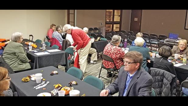Dozens of people attended last Tuesday’s Sherburne County Historical Society annual event and volunteer appreciation dinner. Executive Director Mike Brubaker is in the foreground. (Photo by Susana Kuehne).