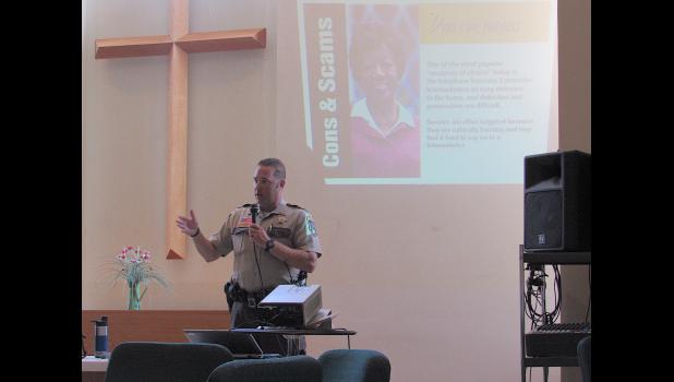Wright Co. Deputy Terry Klaers presents senior safety information during the August Young at Heart event this week. (Photo by Penny Leuthard)