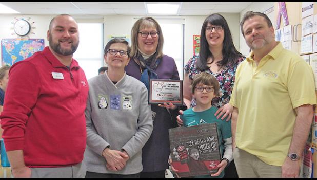 ANDREA COULTER, fifth grade teacher from Clearview, was awarded 99.9 LITE FM’s Educator of the Month. On hand during the presentation were (left to right) Isaac Barton from Central MN Credit Union, Cyn from 99.9, Coulter, Jonathan Hegge, Denise Hegge, and Amos from 99.9. (Photo by Penny Leuthard)