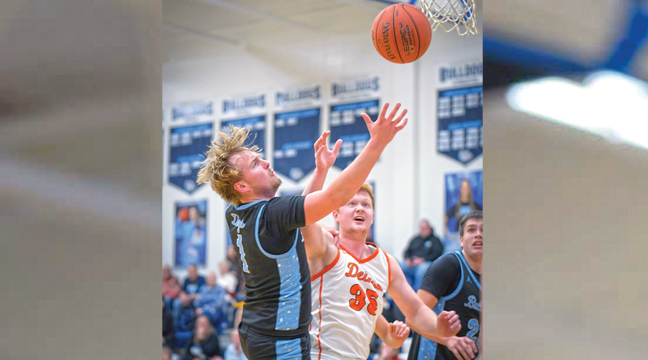 Bulldog Nathan Weiss pictured here in the team’s victory over Delano last week,  recently claimed the career three point record for the Becker boys program. (Submitted Photo.)