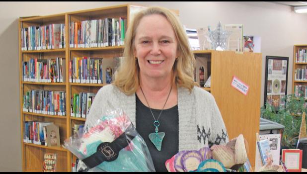 RETIRING CLEARWATER LIBRARIAN Cyrene Bastien was inundated with well wishes during the open house celebrating her retirement last week. (Photo by Penny Leuthard)