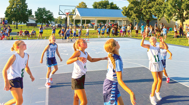 A Becker GIRLs basketball team battled for a rebound during Tuesdays’ 3-on-3 tournament at the Becker Community Center. The weather was ideal for early August and the crowds were enjoying the competition throughout the evening. (Submitted Photo).