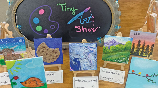 MINIATURE WORKS OF ART are currently on display at the Clearwater Public Library. (Photo by Penny Leuthard.)