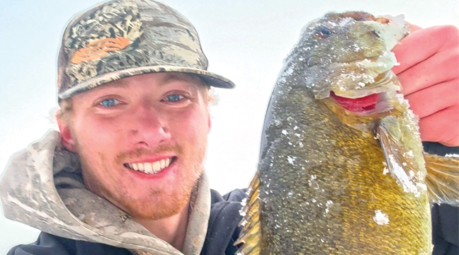 Jake Drahota holding a fish he caught earlier this year. (Submitted Photo).