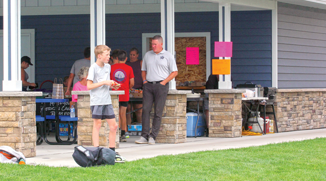 MIKE + YOU = CURE volunteers manned the concession stand during the tournament. (Patriot Photo by Bill Morgan).