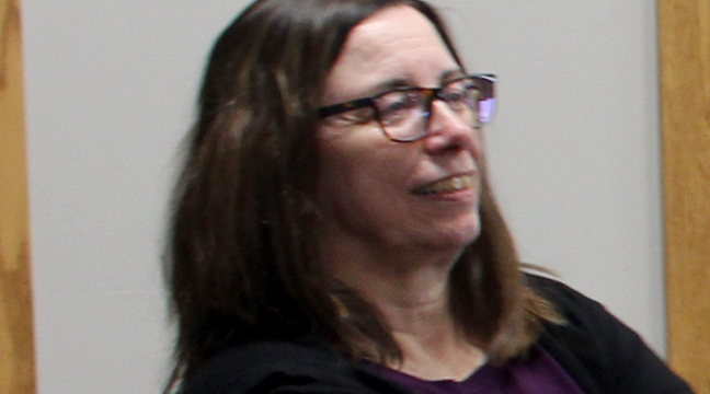 KIM NODING was all smiles as the Big Lake Council members canvassed the vote two days after the special election. She officially took her seat on the council April 23. (Photo by Katherine Cantin.)