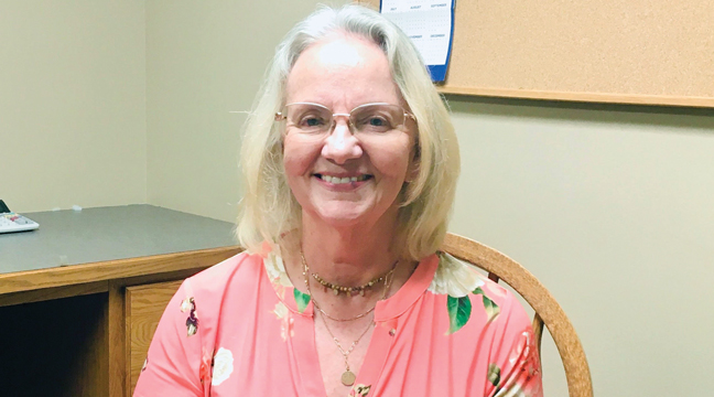 The smile that has greeted Sherburne State Bank customers for 42 years. Carol Lucius is retiring after 42 years with the bank. (Patriot Photo by Andrew Diemand).